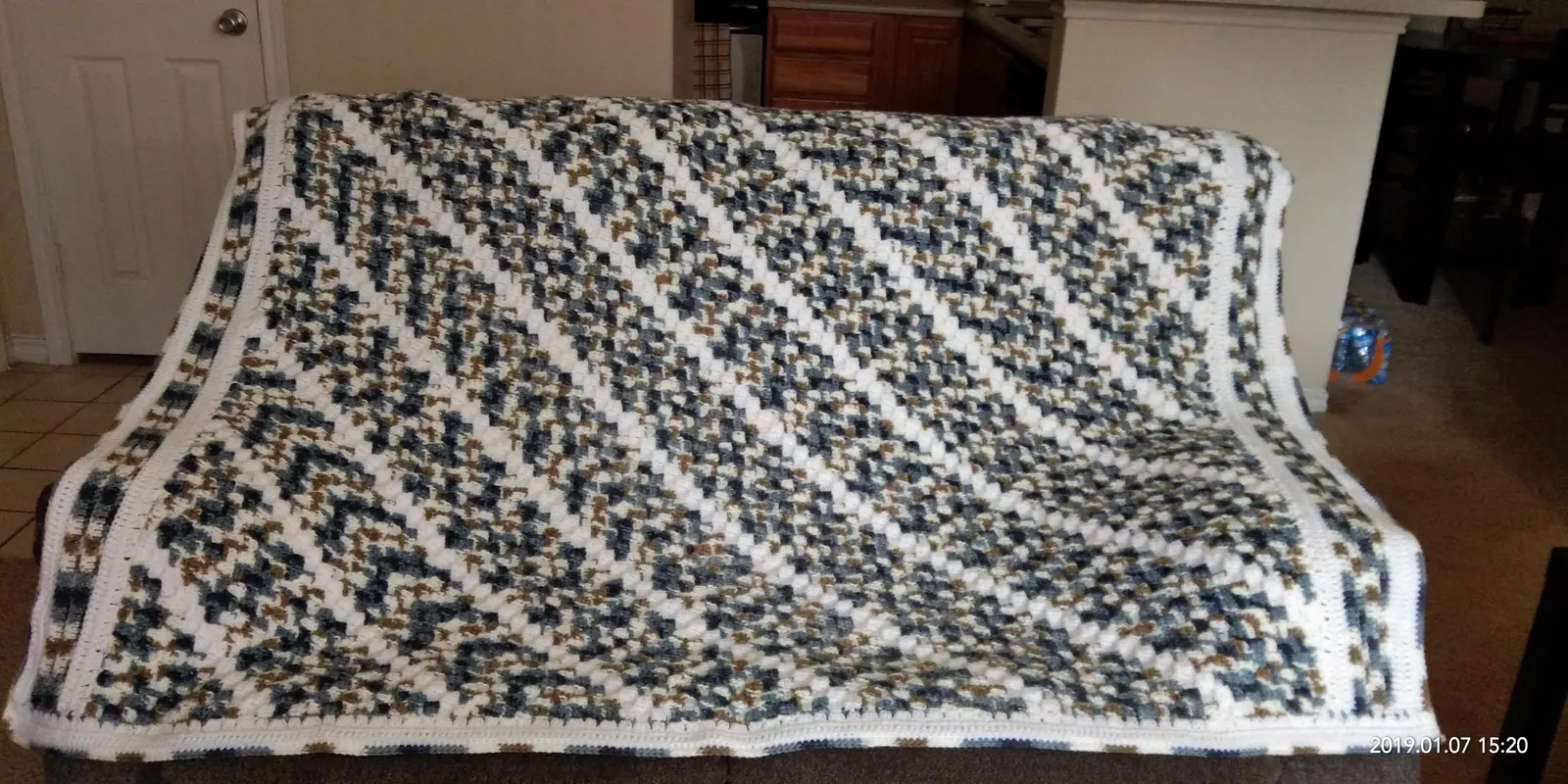 Ribbed adult crochet scarf in autumn tones