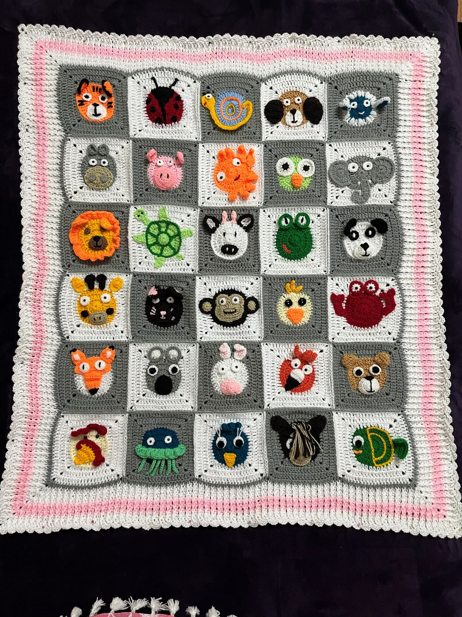 Handmade crochet baby blanket in neutral palette