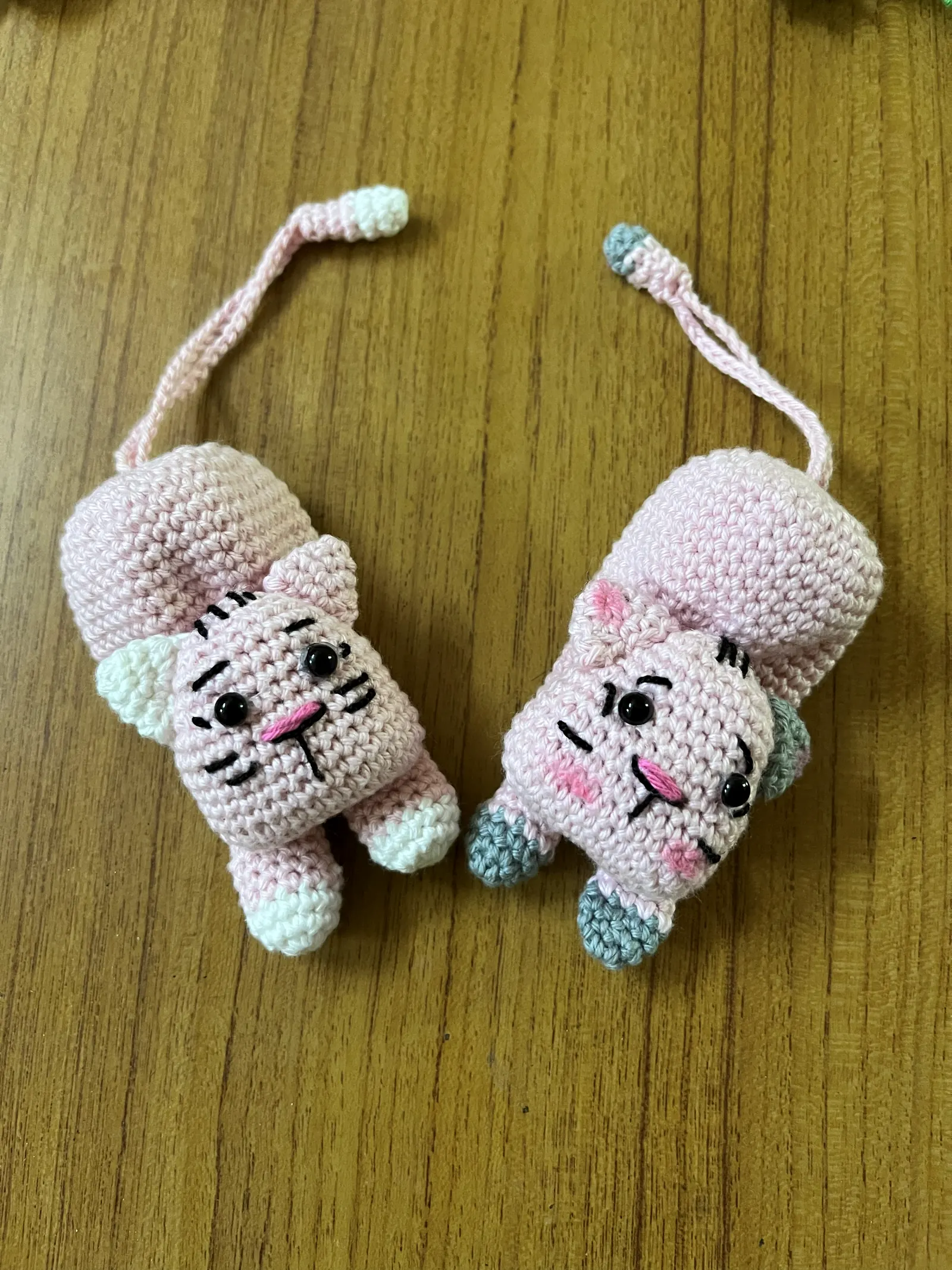 Magenta crochet heart keychain with floral embroidery