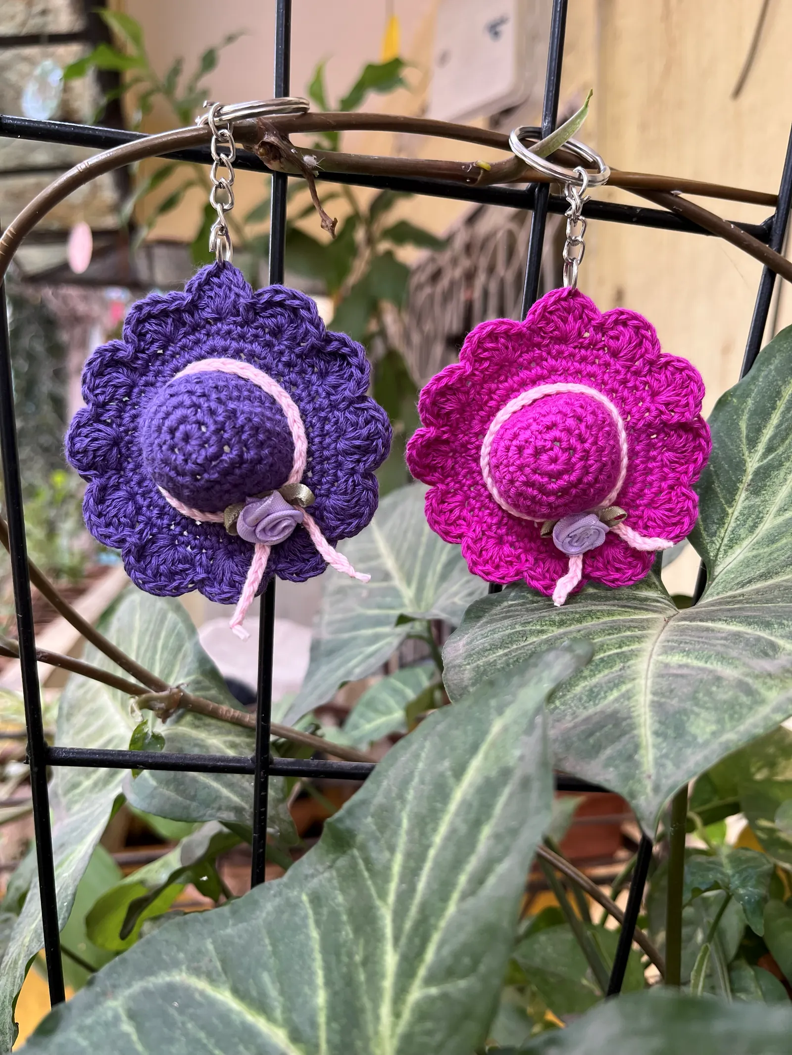 Purple and pink hat-style crochet keychains