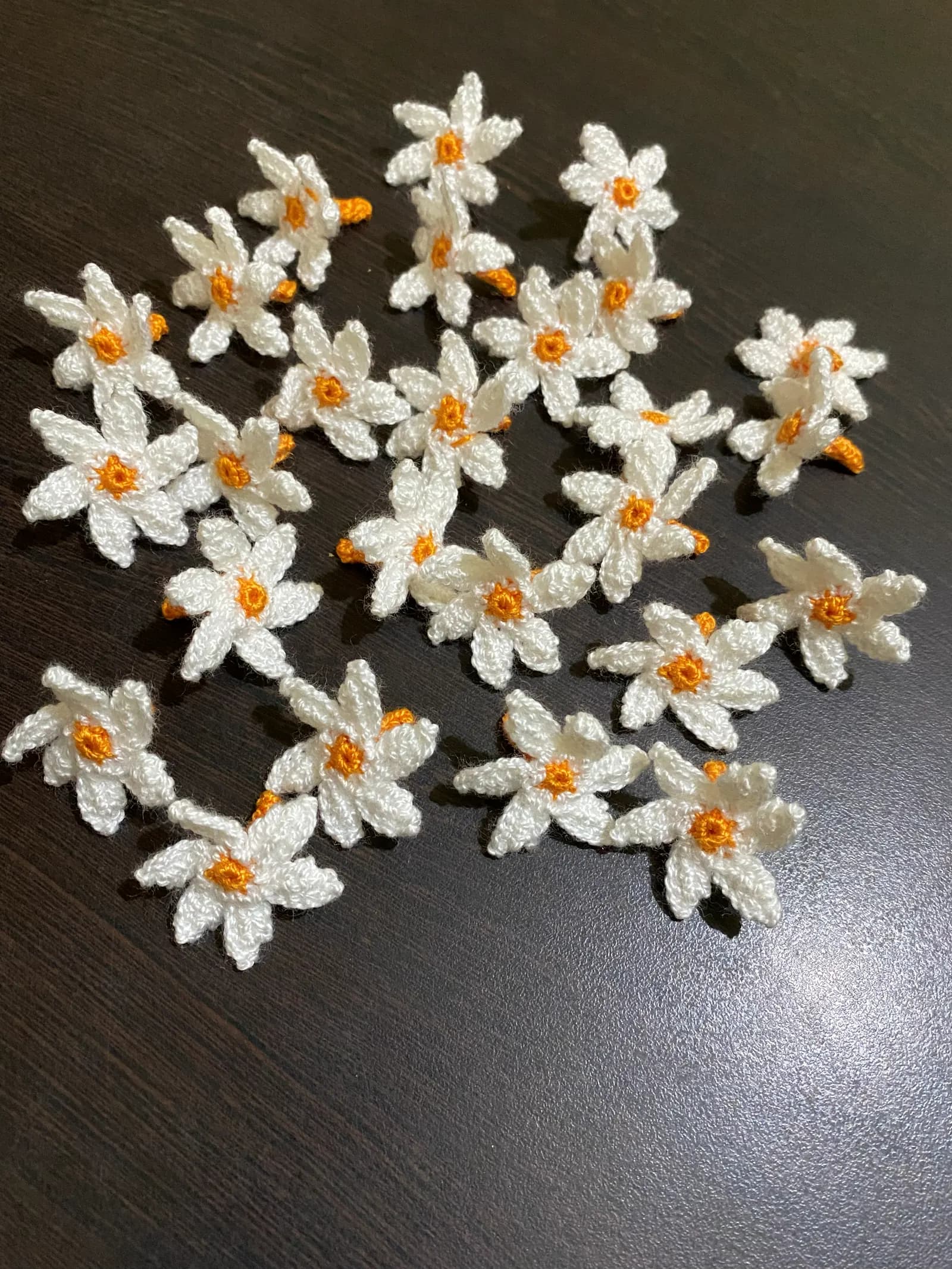 Colorful crochet flowers for rangoli decor