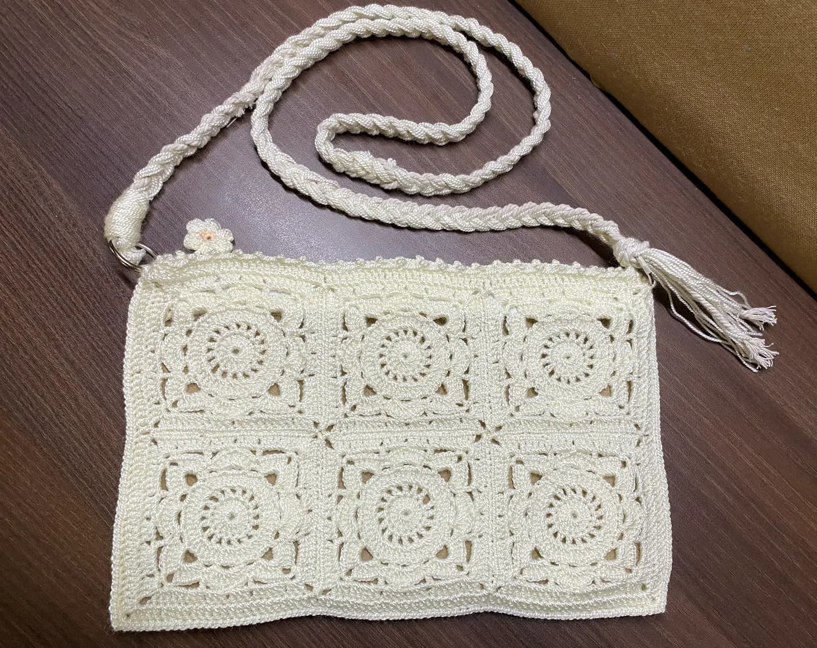 Brown crochet travel pouch