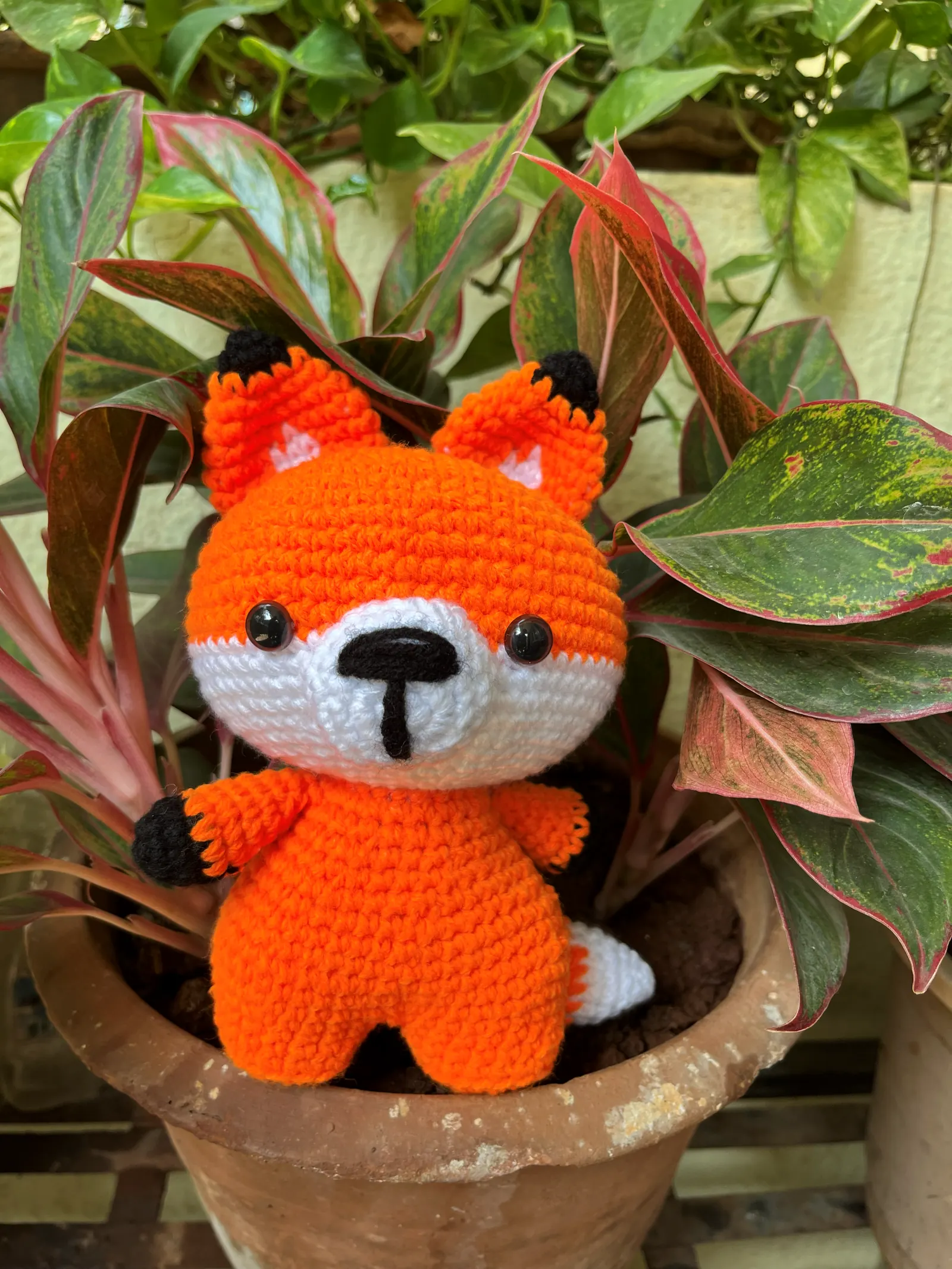 Handmade orange crochet fox toy